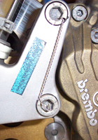 Brake mount safety wired